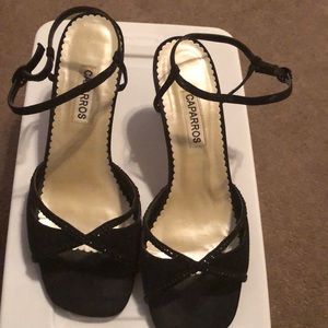 Black strap sandal with black clutch purse